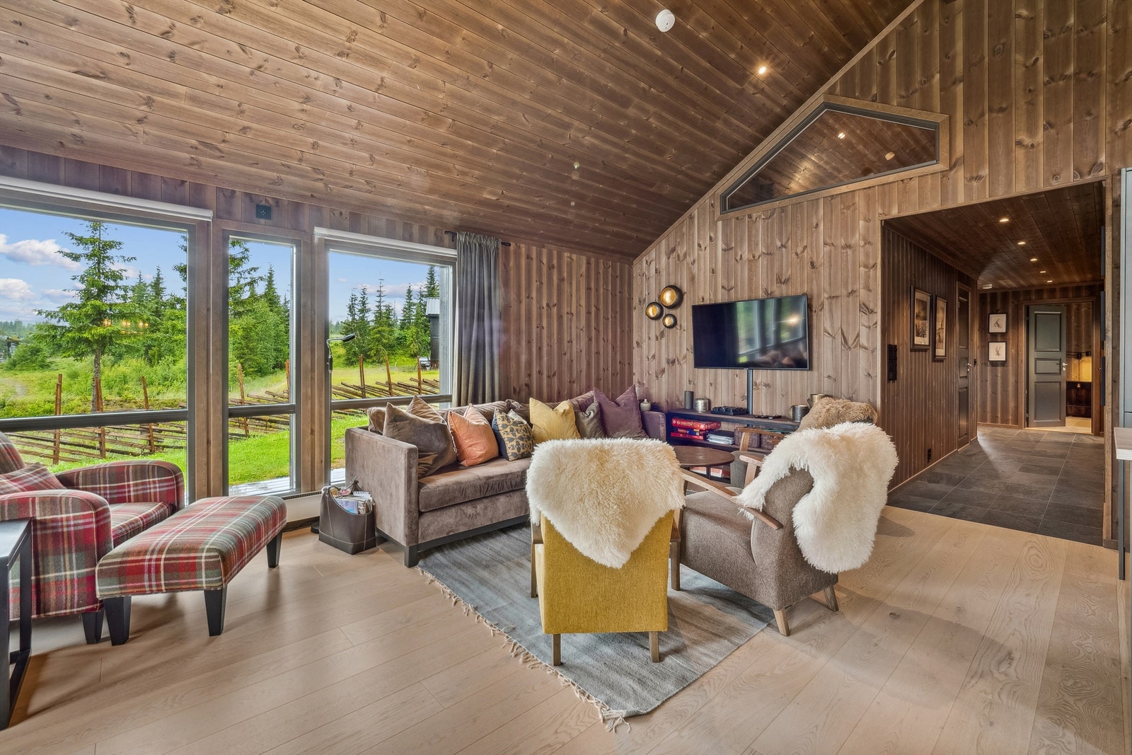 Her kan slappe av i sofaen og nyte kveldene til det fulle. Galleribilde