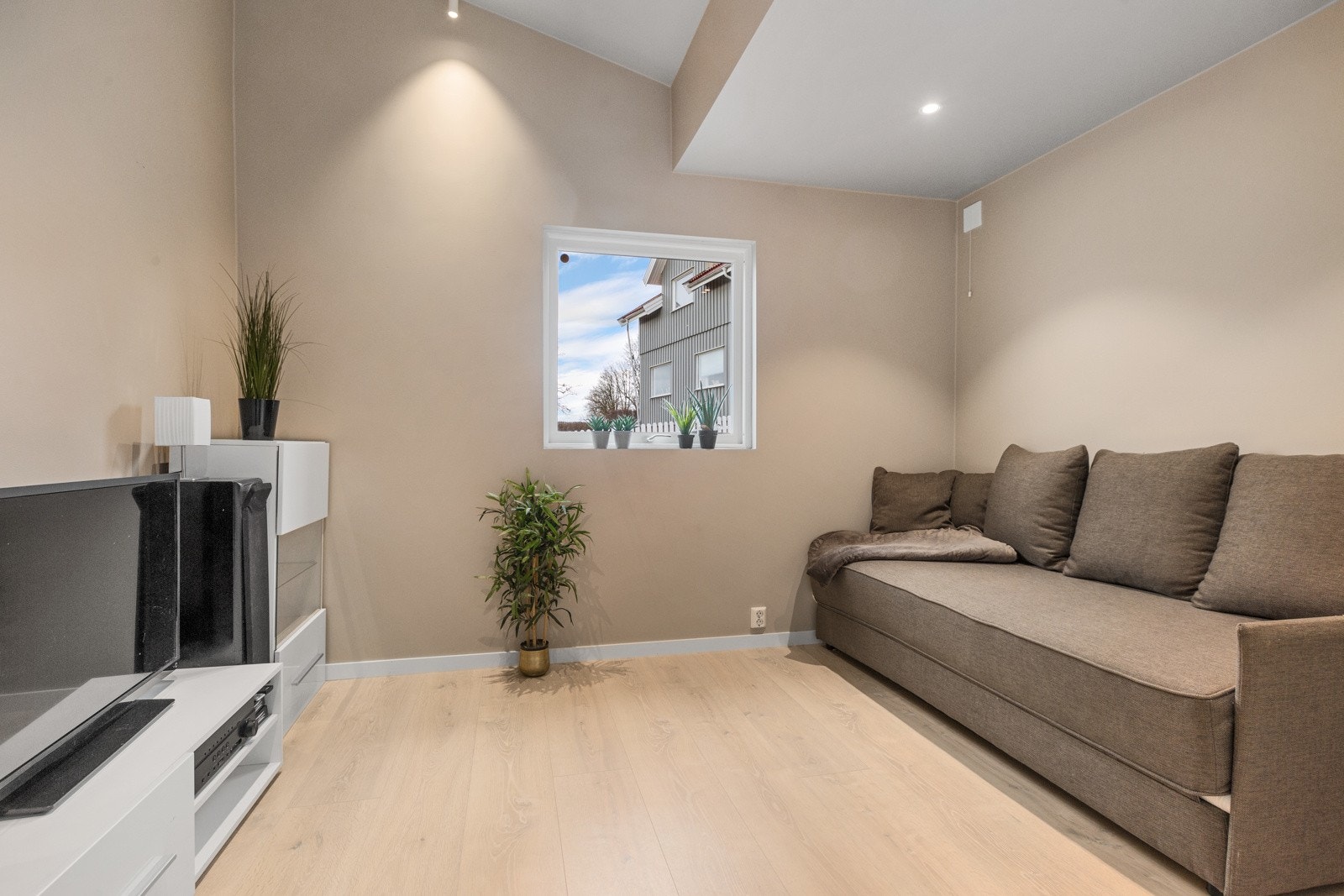 Tv-stue/soverom Galleribilde