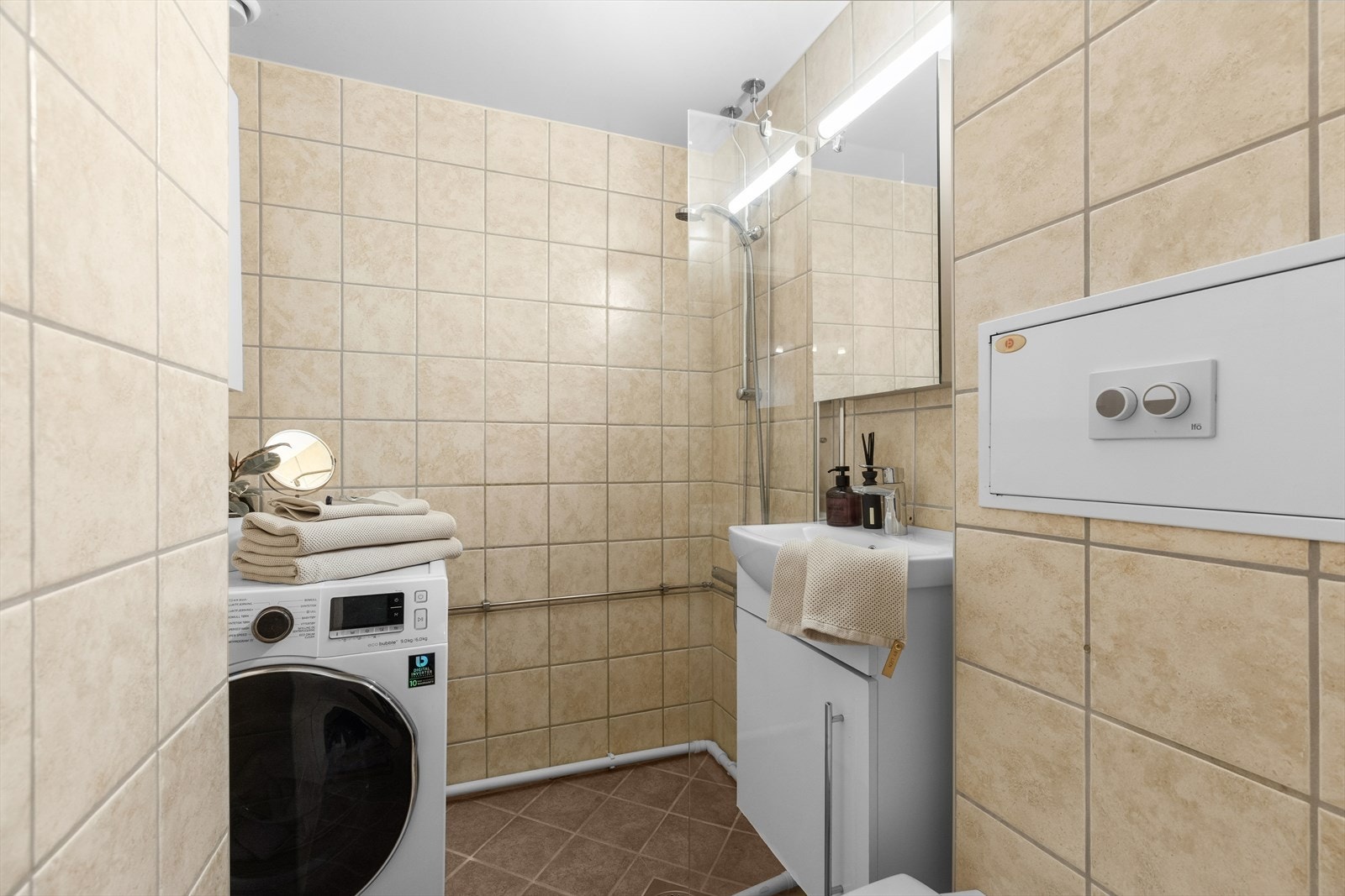 Flislagt bad pusset opp i regi av borettslaget Galleribilde