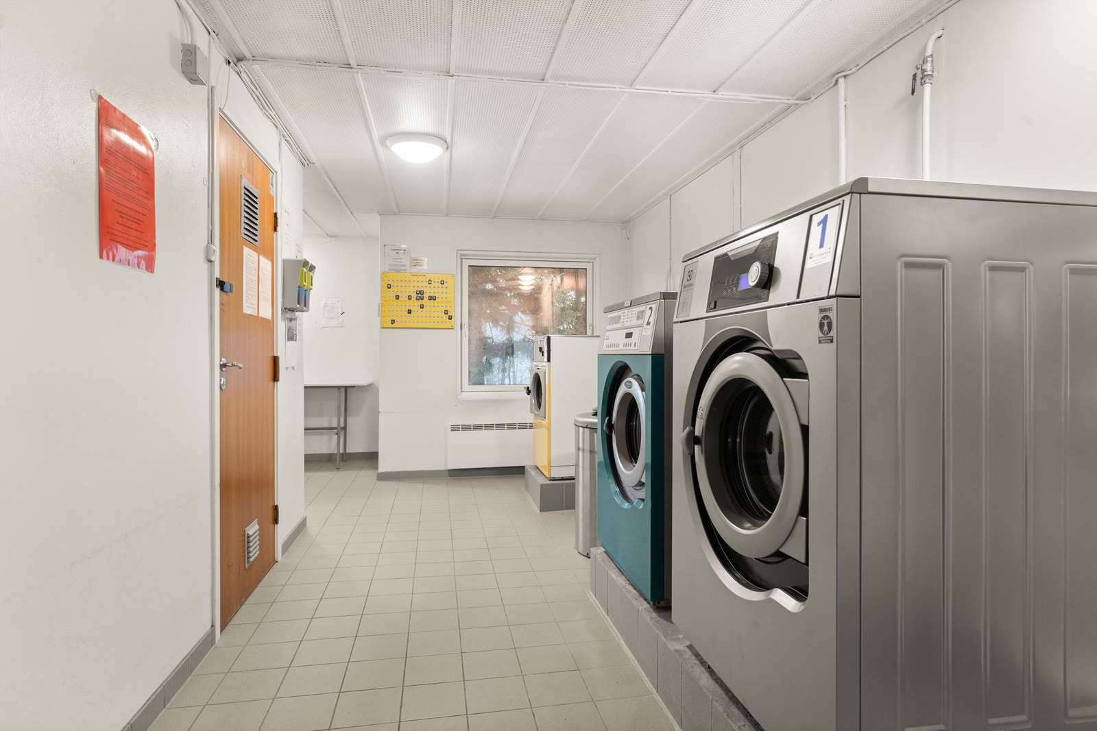 Borettslaget har felles vaskeri i kjeller. Galleribilde