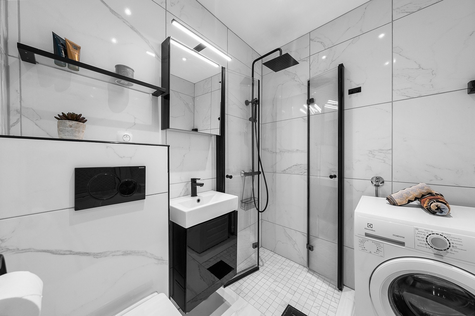 Opplegg for vaskemaskin. Elektriske varmekabler på gulv. Galleribilde