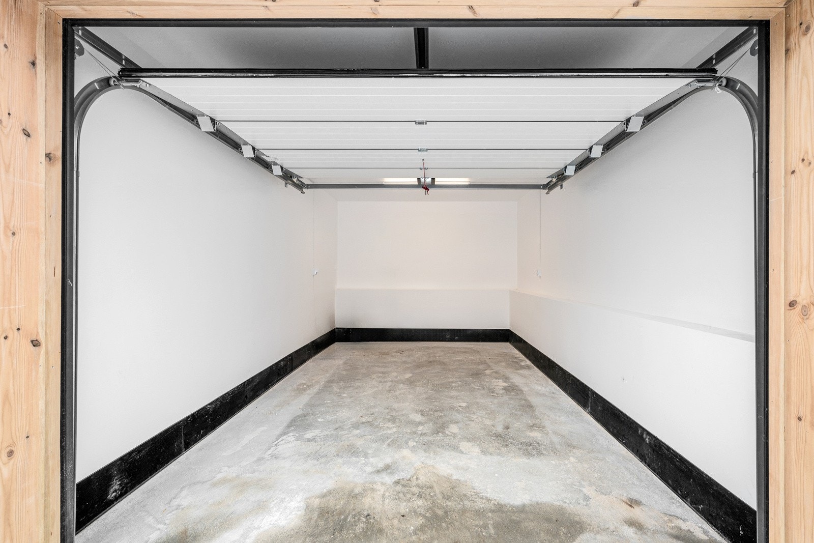 Det er tilrettelagt for elbillader i begge garasjene. Galleribilde