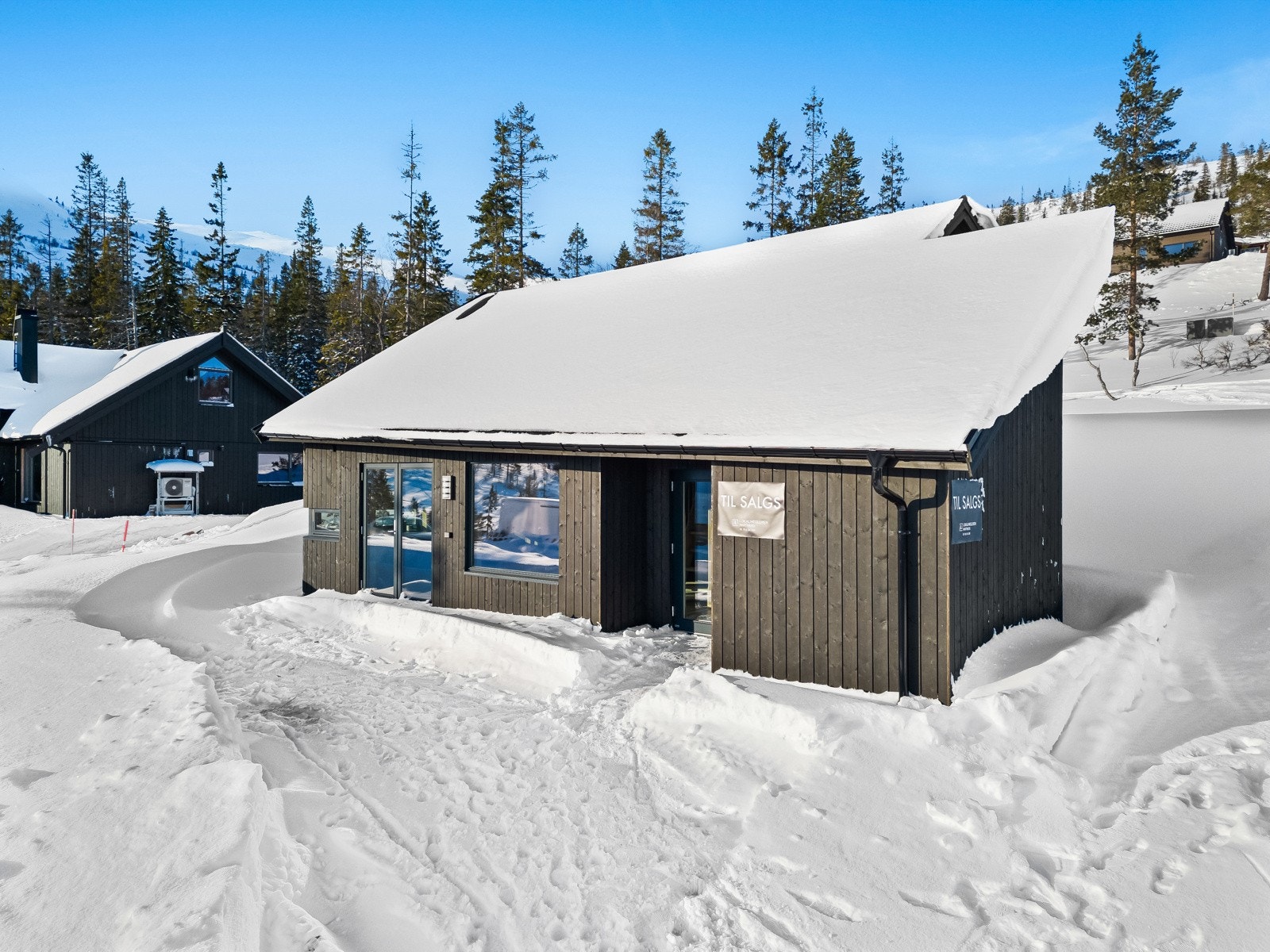 Ved inngangsparti har man også sportsbod. Galleribilde