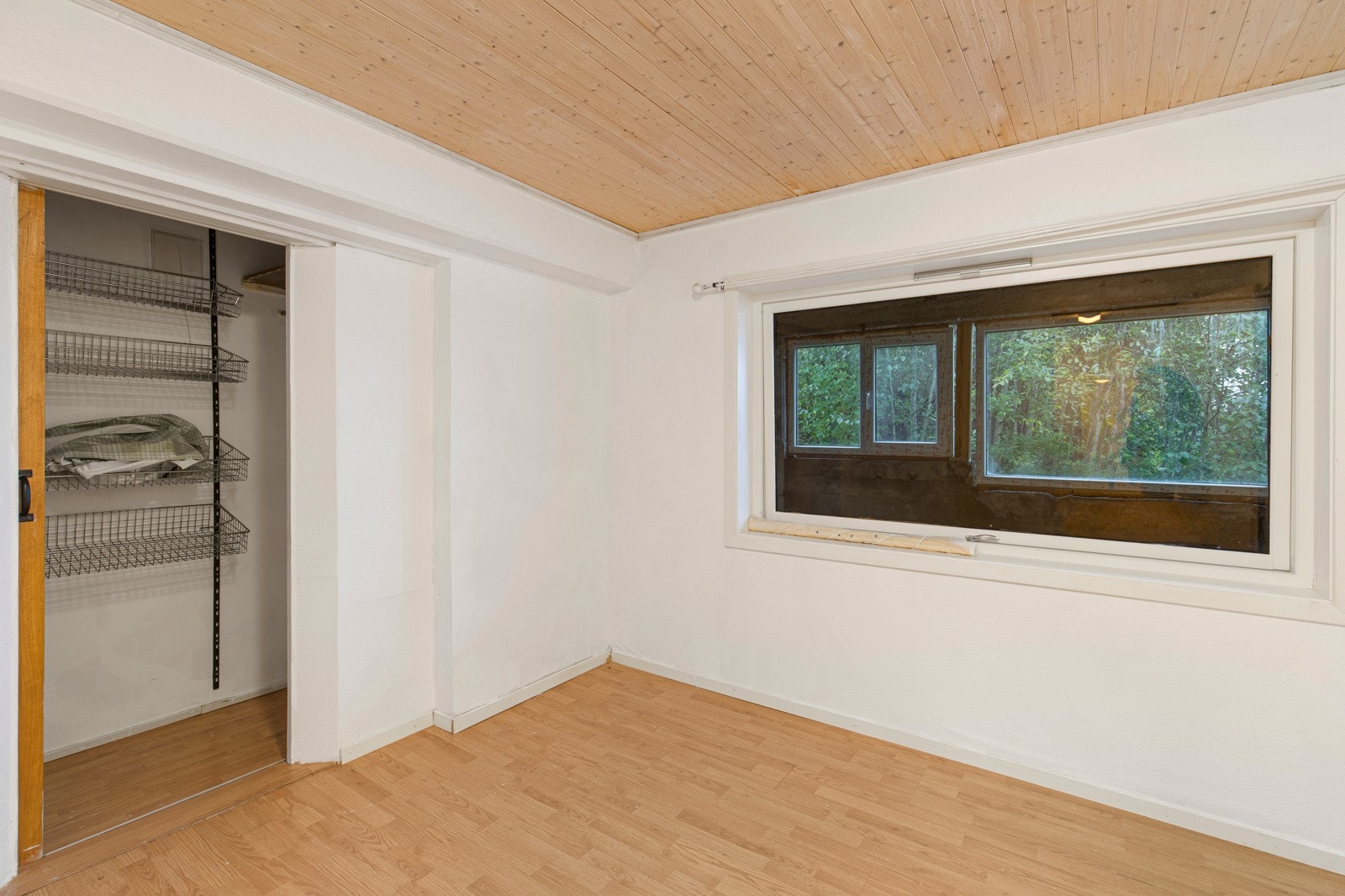 Ett soverom i kjelleretasjen. Galleribilde