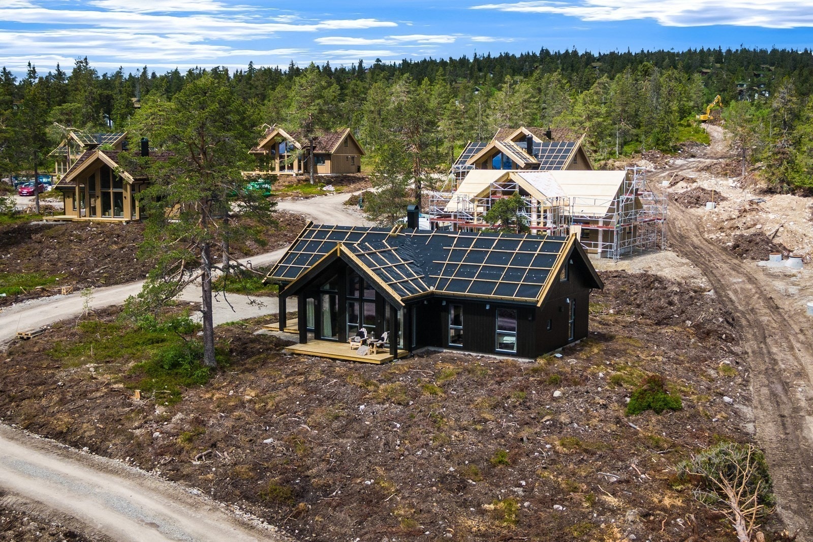 Her er modellen Bergstua under bygging på Budor. Dette er en visningshytte som dere gjerne kan få besøke for å oppleve hyttemodellen. Galleribilde