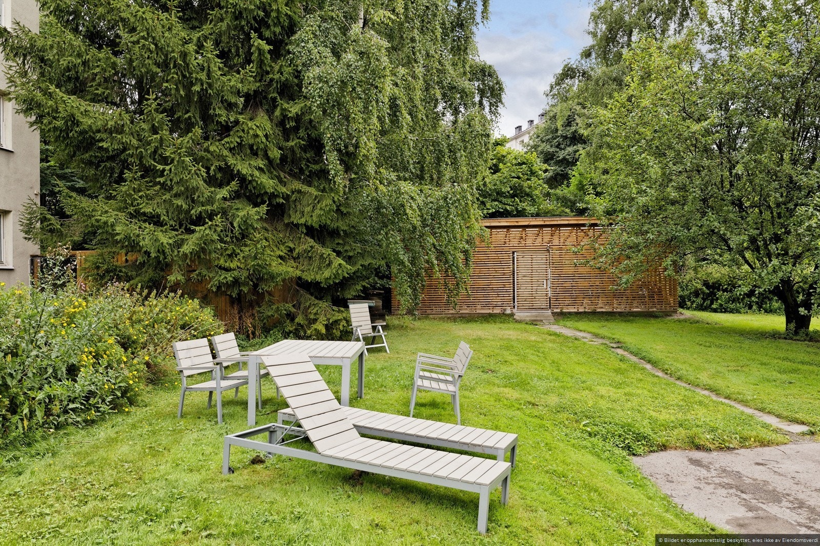 Fellesområde - Sykkelparkering i bakgrunnen Galleribilde