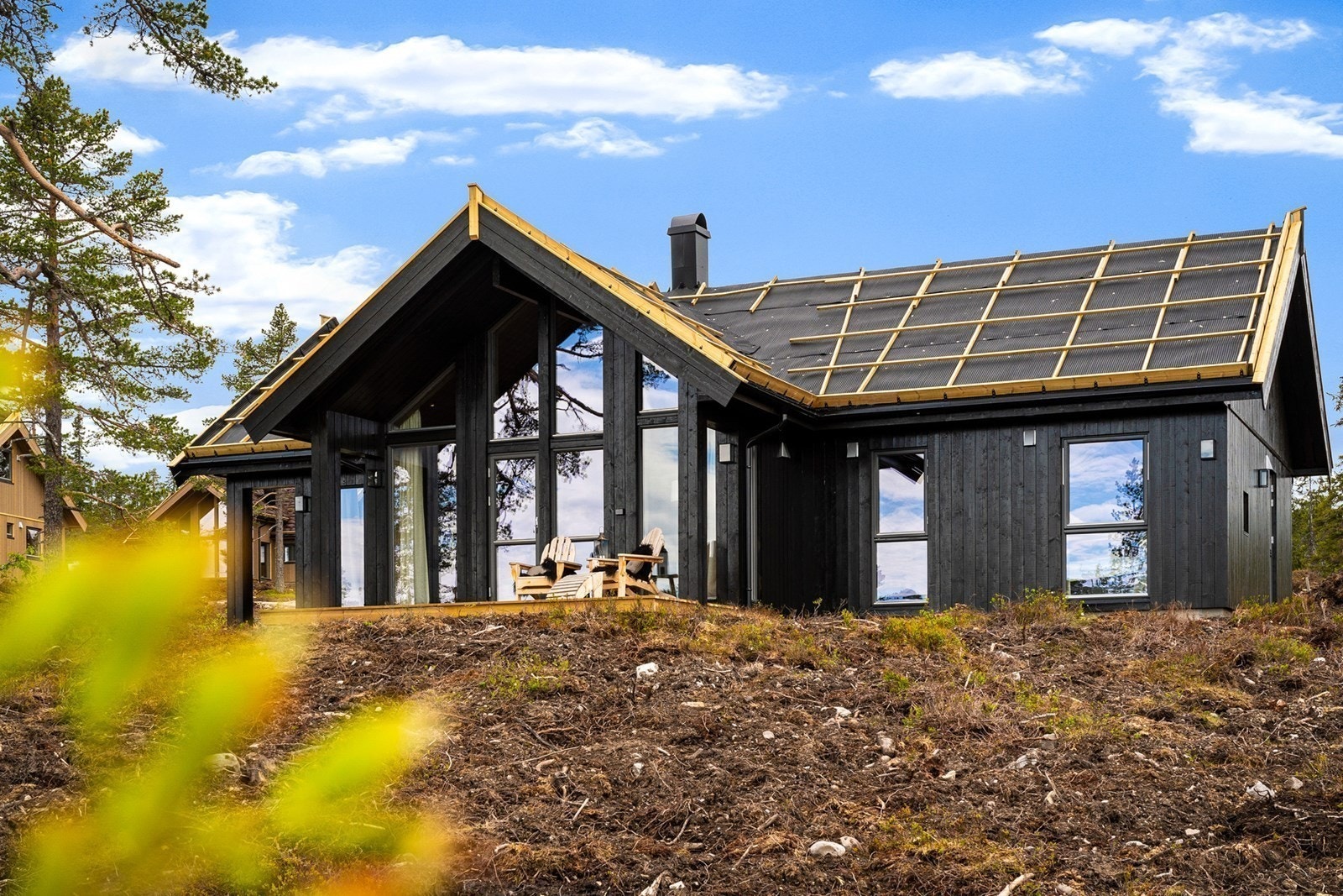 Her er modellen Bergstua under bygging på Budor. Dette er en visningshytte som dere gjerne kan få besøke for å oppleve hyttemodellen. Galleribilde