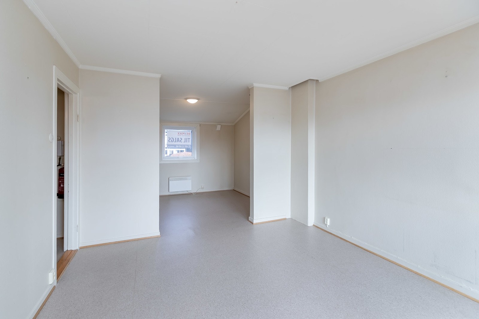 Stuen er lys men har behov for noe oppussing Galleribilde