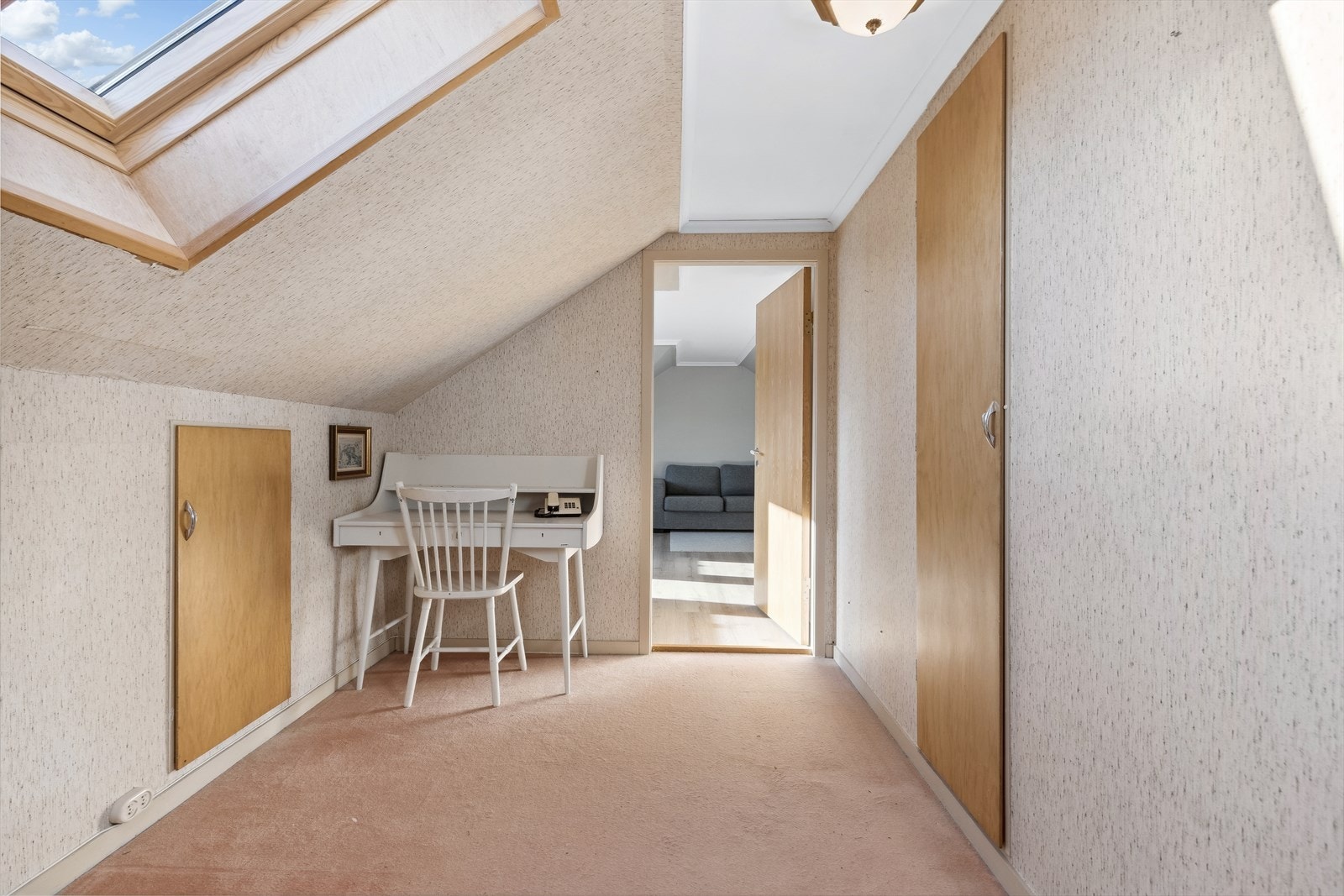 Opp trapp kommer du til boligens loft. Galleribilde