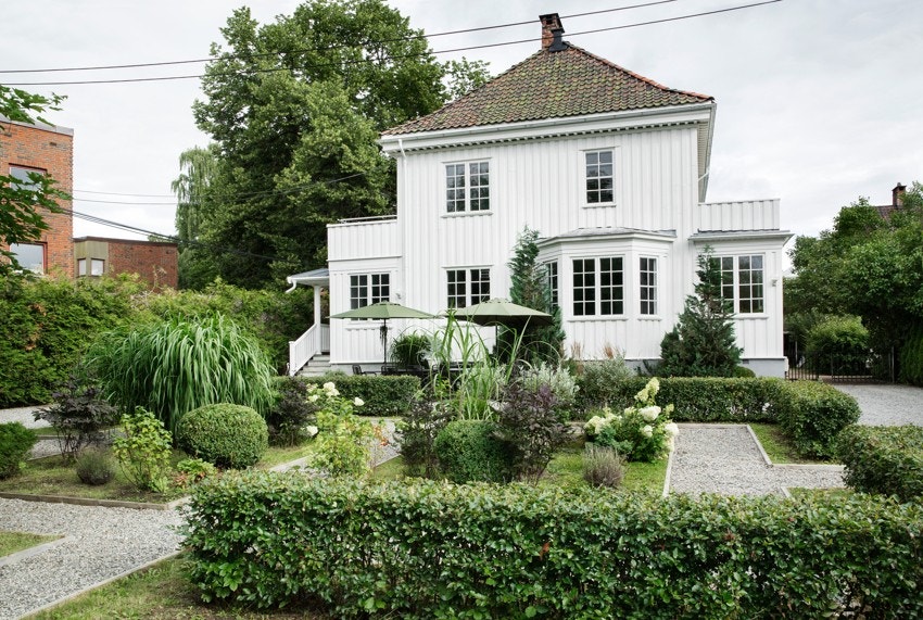 Et elegant townhouse, delikat pusset opp med en blanding av luksus og uformell eleganse, inspirert av den franske vakre stilen Galleribilde