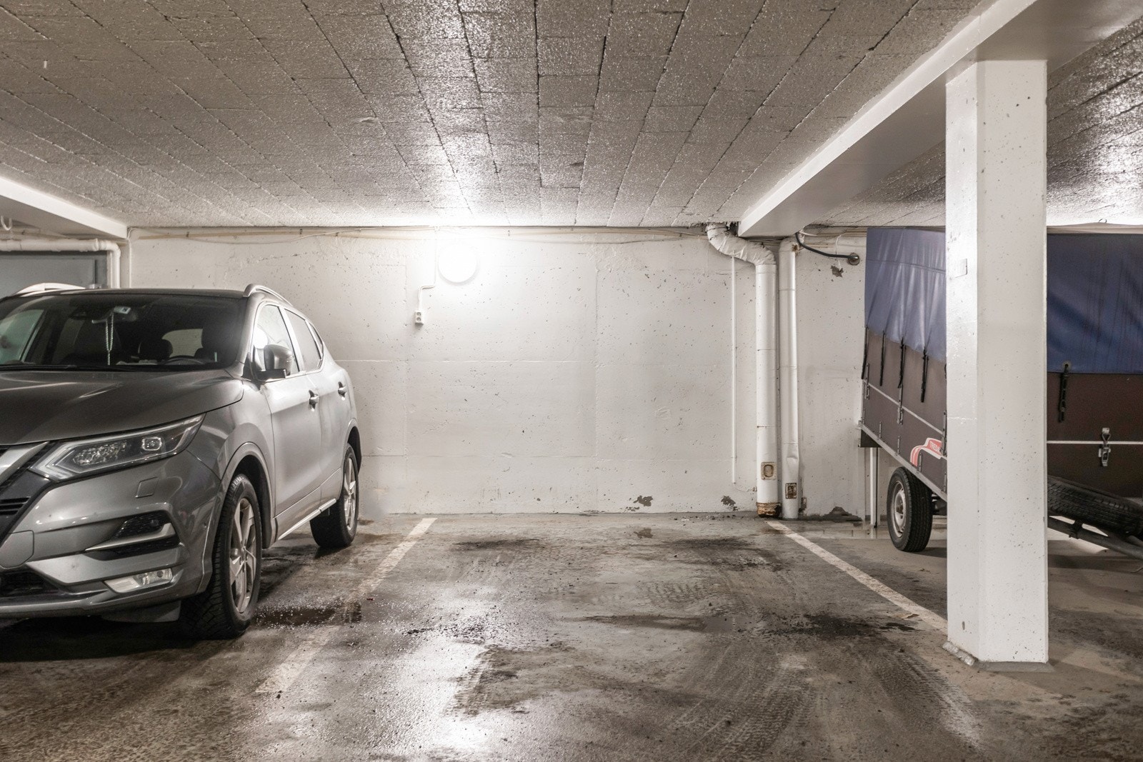 Garasjeplass med heis direkte til leilighetsplan. Galleribilde