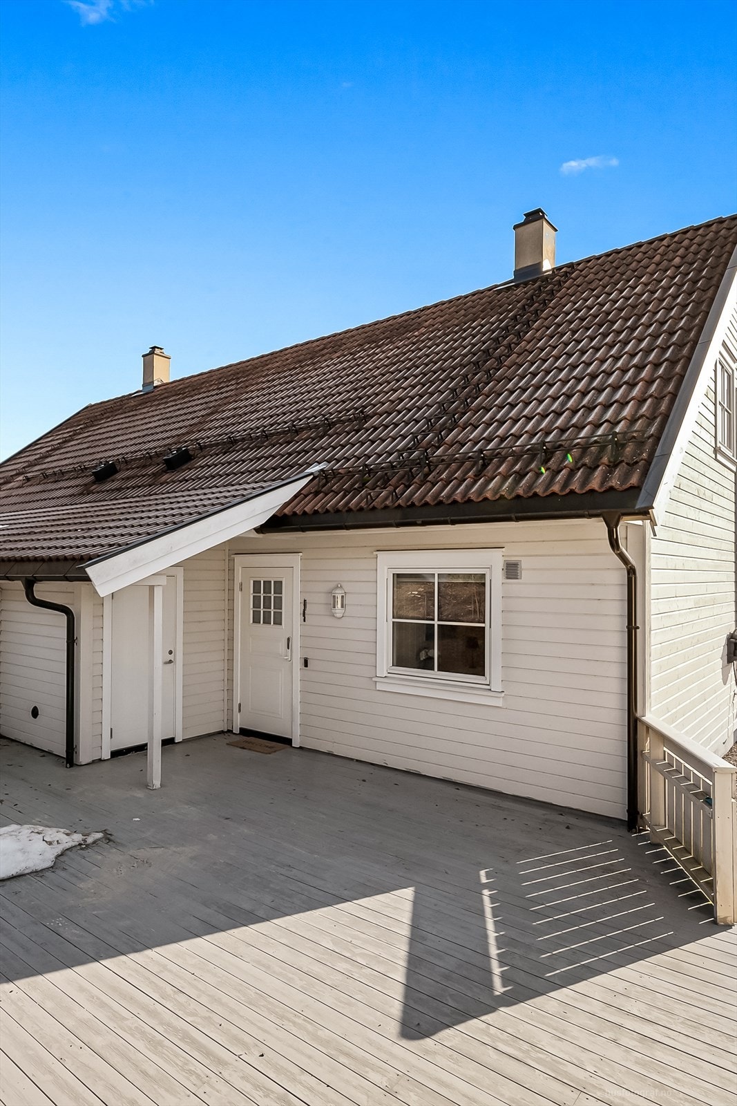 Nordvestvendt platting på ca. 47 kvm v/inngangspartiet Galleribilde