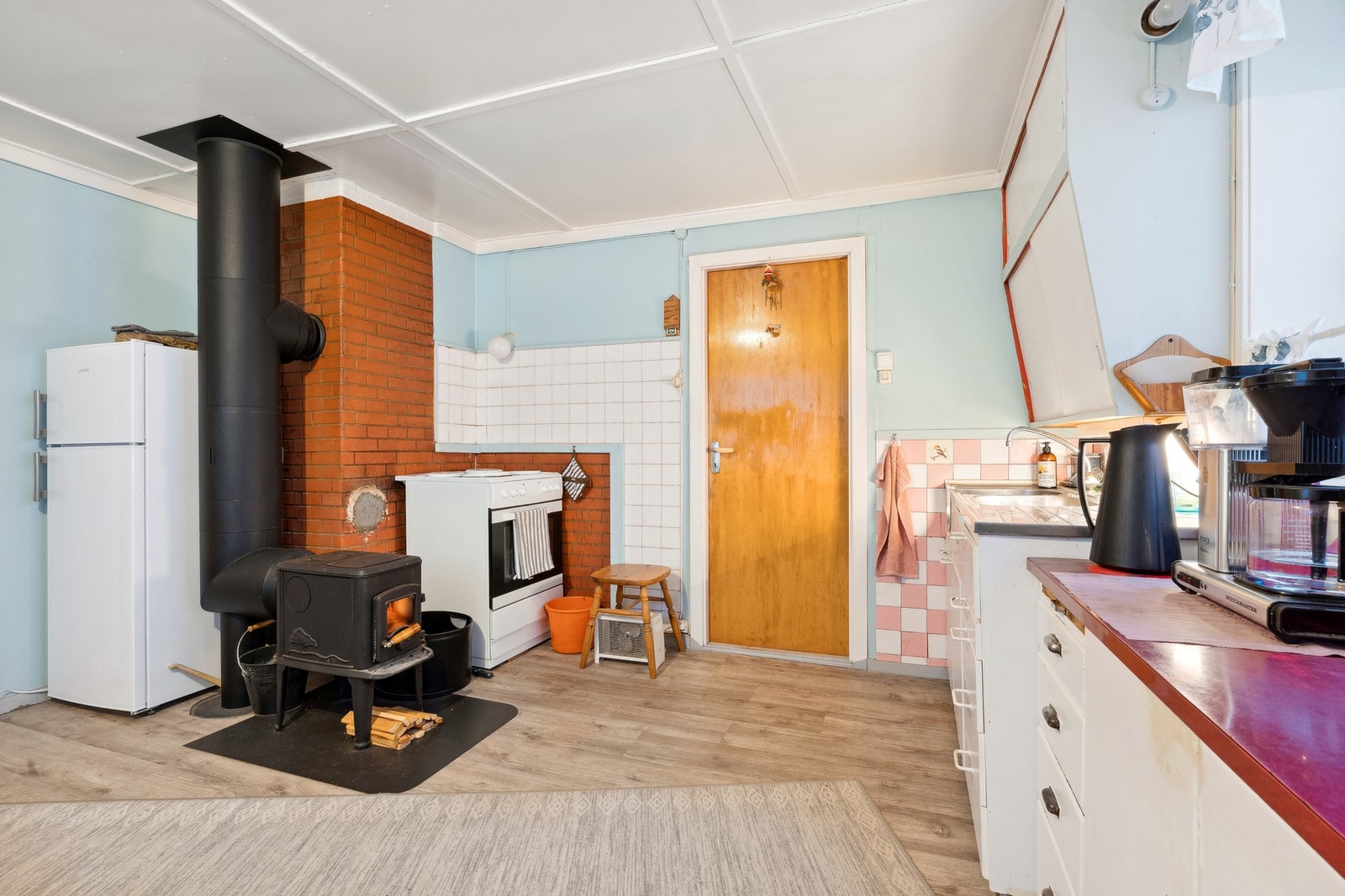 Boligen fikk ny innvendig stålpipe og to nye ovner i 2013 Galleribilde