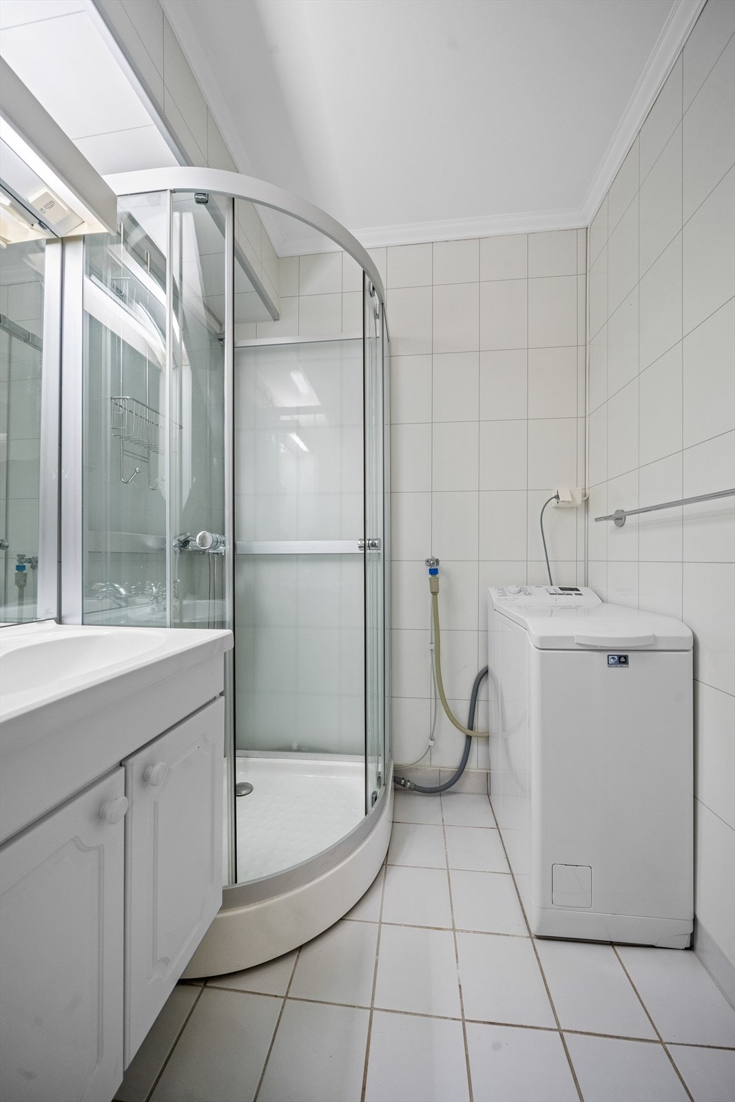 Badet har opplegg for vaskemaskin. Galleribilde