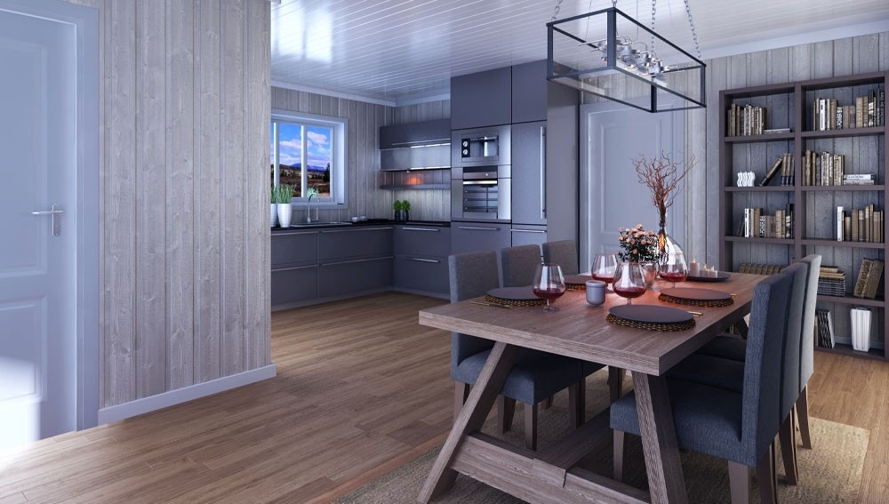 Vinduene gir mye lys,og bringer naturen tettere på. Her vises kjøkken/spisestue.
(Ferdig hytte kan avvike noe fra bildet) Galleribilde