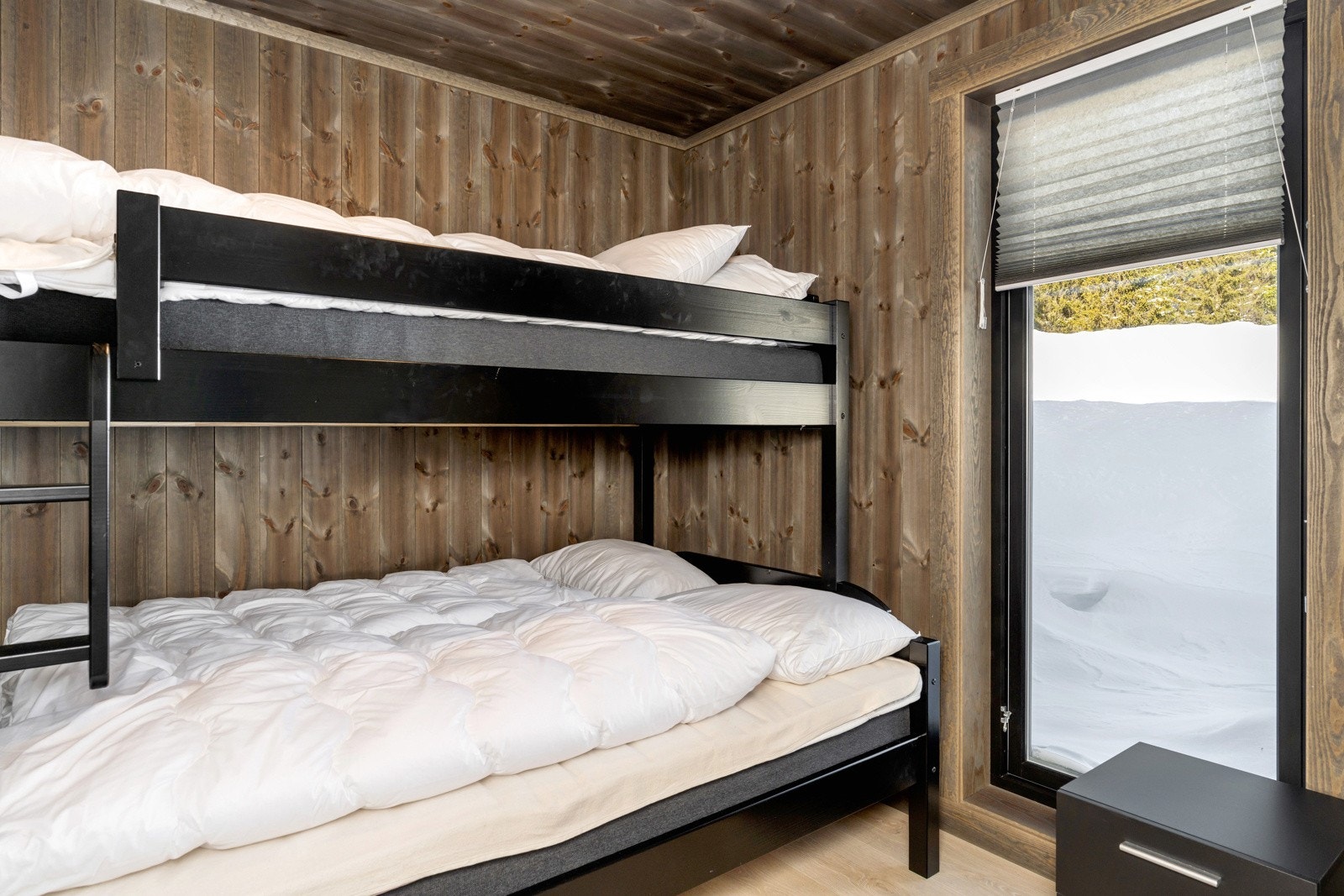 Det andre soverommet er innredet med familiekøye. Galleribilde