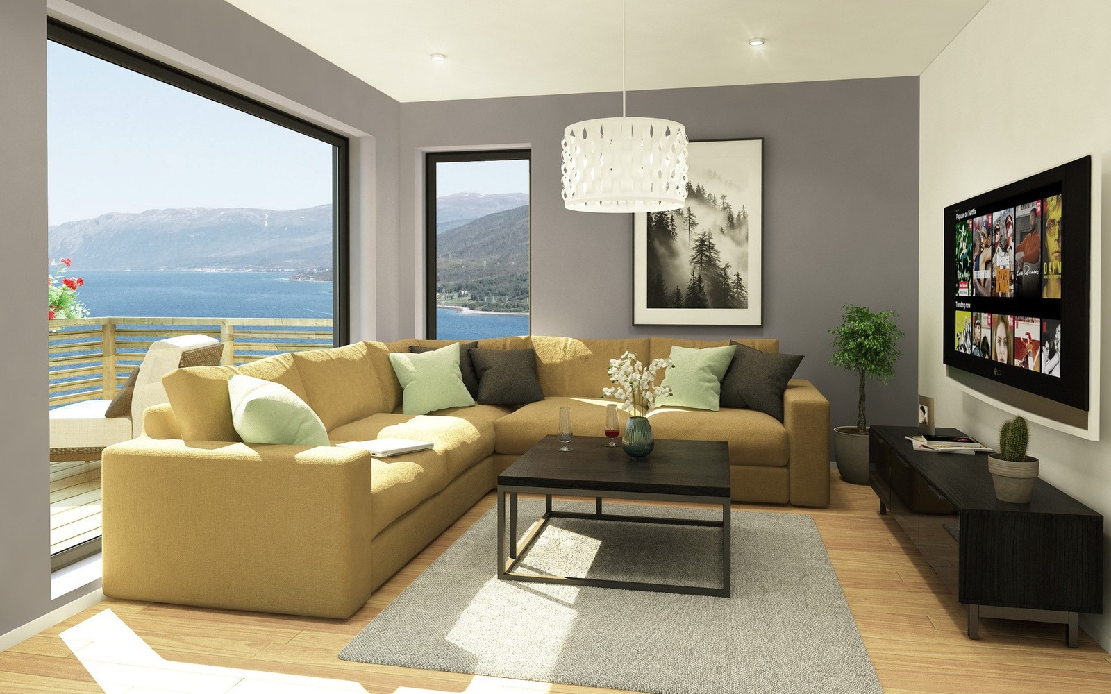 Lys og trivelig stue hvor man kan nyte de flotte utsikten. Utgang til balkong Galleribilde