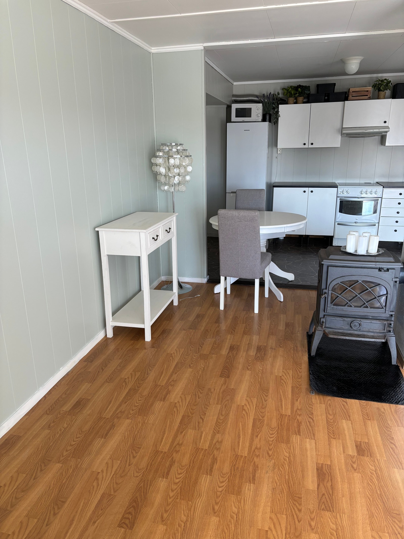 Stua med vedovn Galleribilde