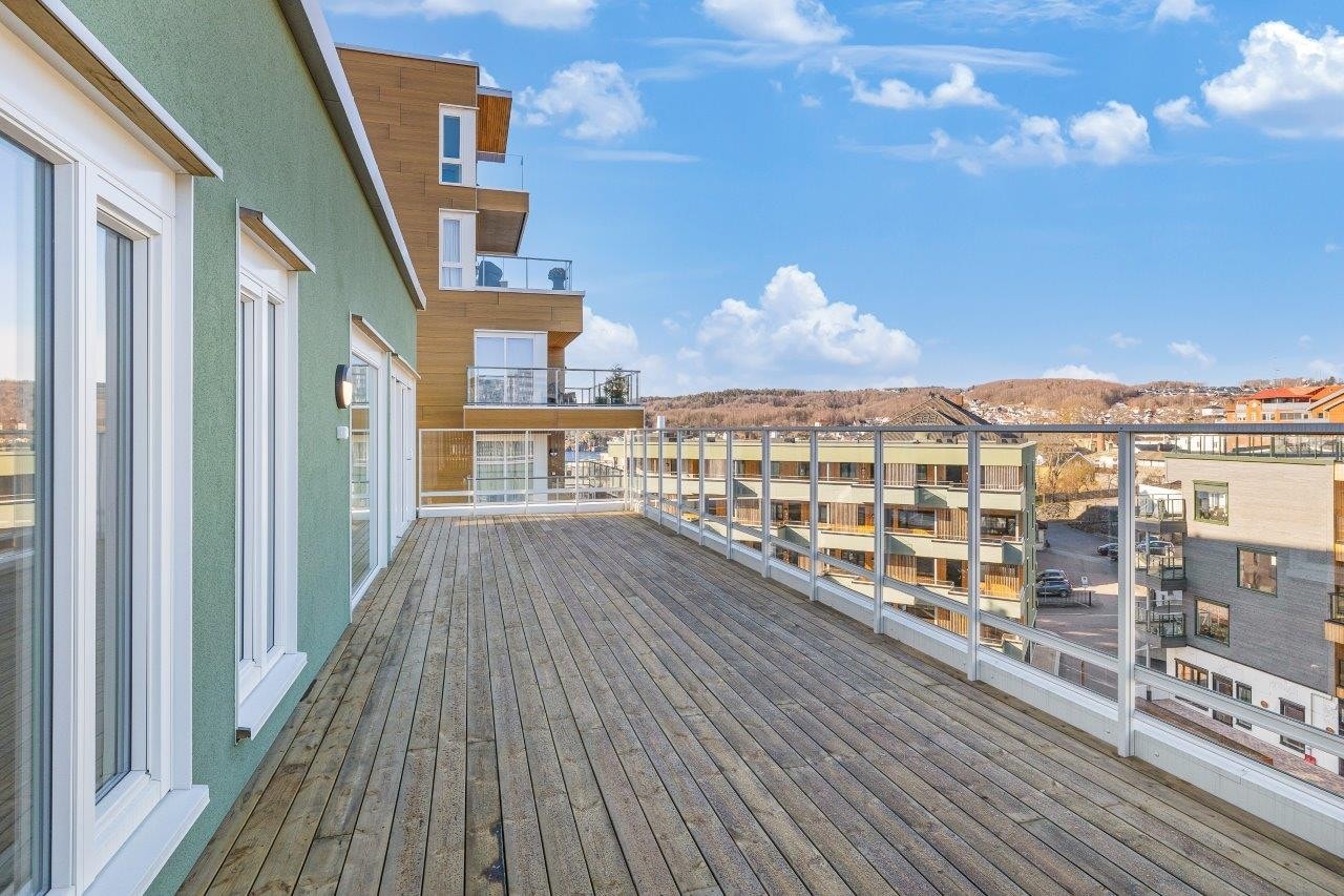 Her har du fin utsikt over Grandplassen Galleribilde