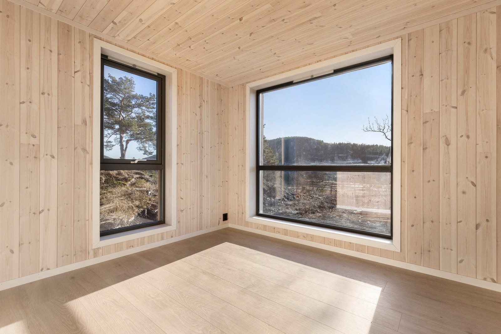 Våkne opp med utsikt til vannet fra hovedsoverommet. Galleribilde
