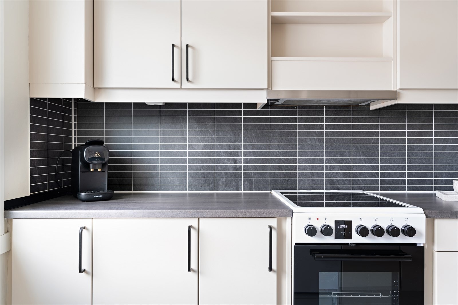 Det er lagt kitchenboard over benkeplate. Galleribilde