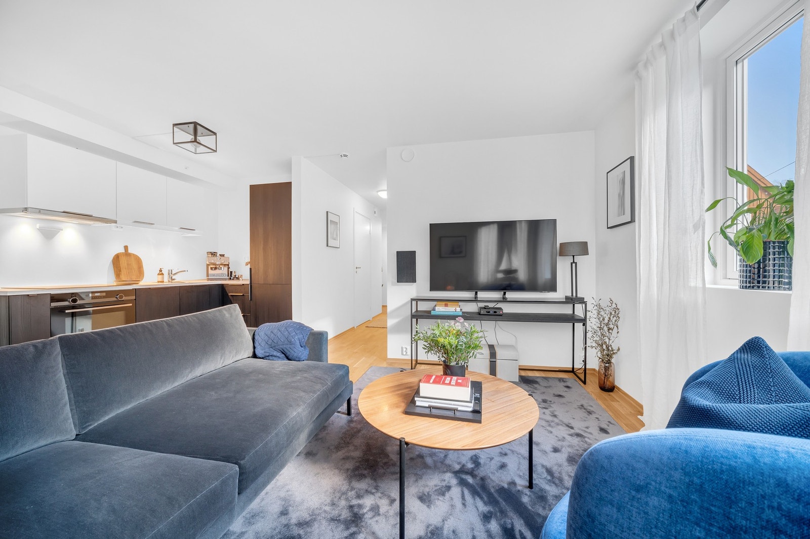 Leiligheten har en åpen stue/kjøkken-løsning som er lett å innrede. Galleribilde