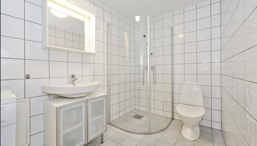 Flislagt bad med varme i gulv Galleribilde