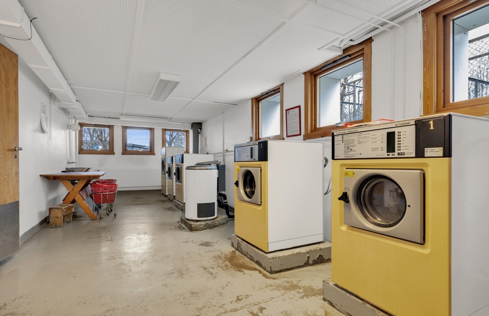 Leiligheten har tilgang til et fellesvaskeri i borettslaget Galleribilde