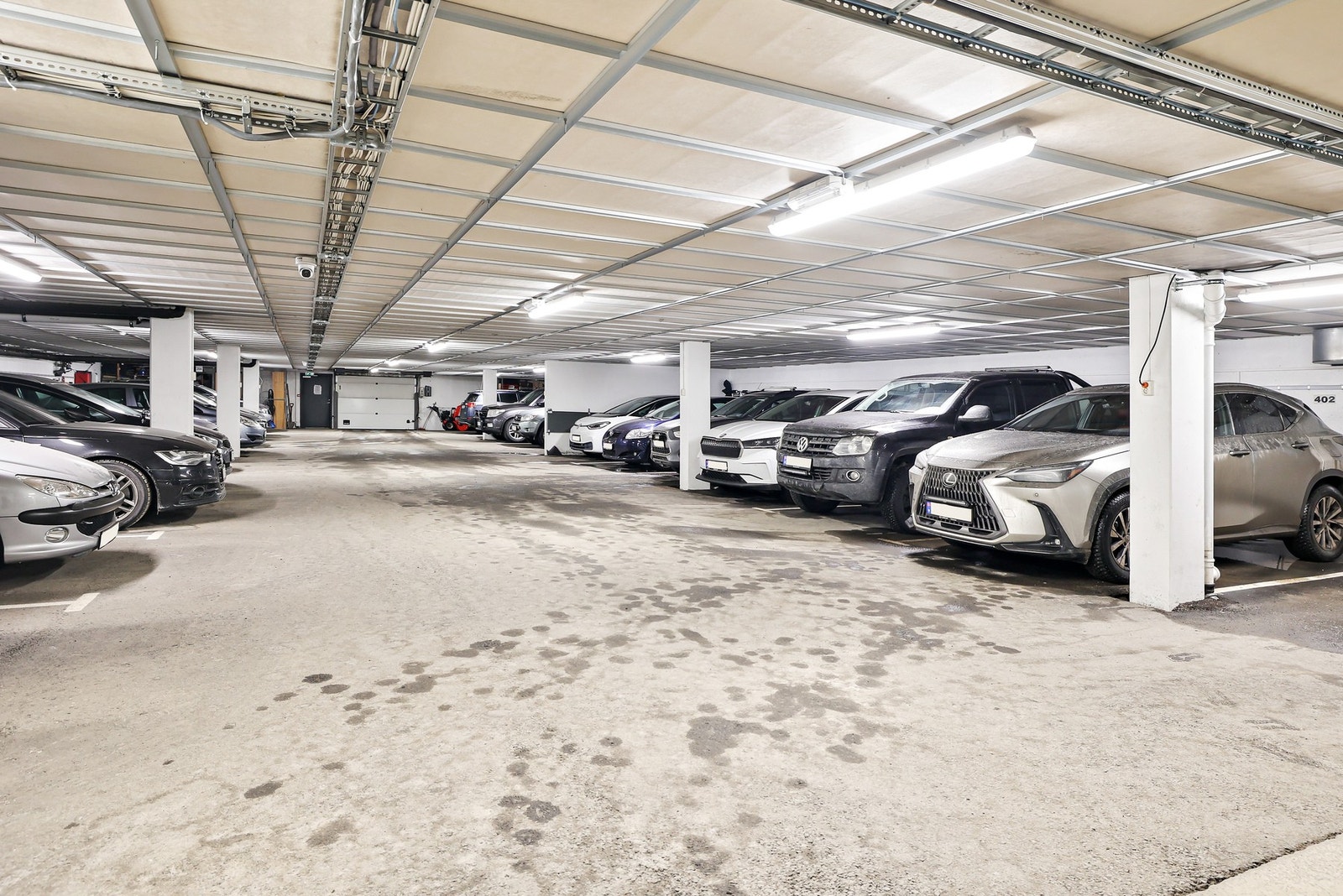 Leiligheten har parkeringsplass i parkeringskjeller Galleribilde