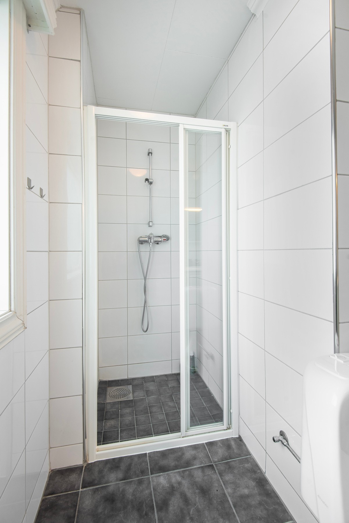 Dusjhjørne. Galleribilde