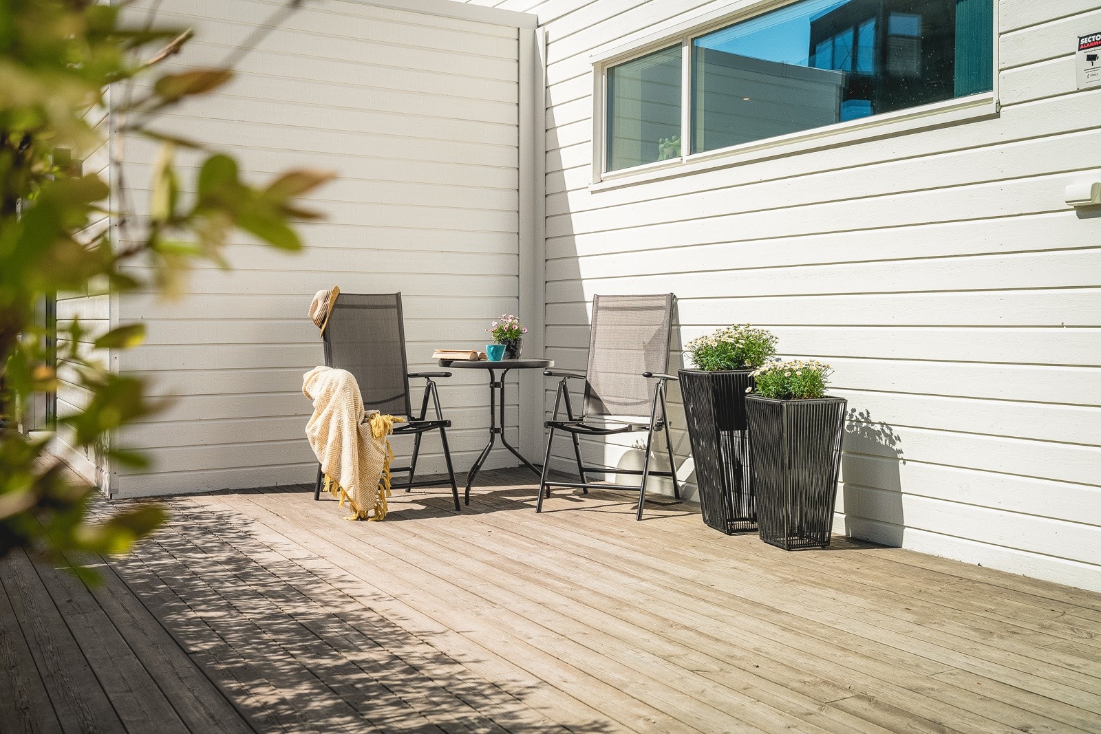 Ved inngangspartiet kan du nyte deilig morgensol. Galleribilde