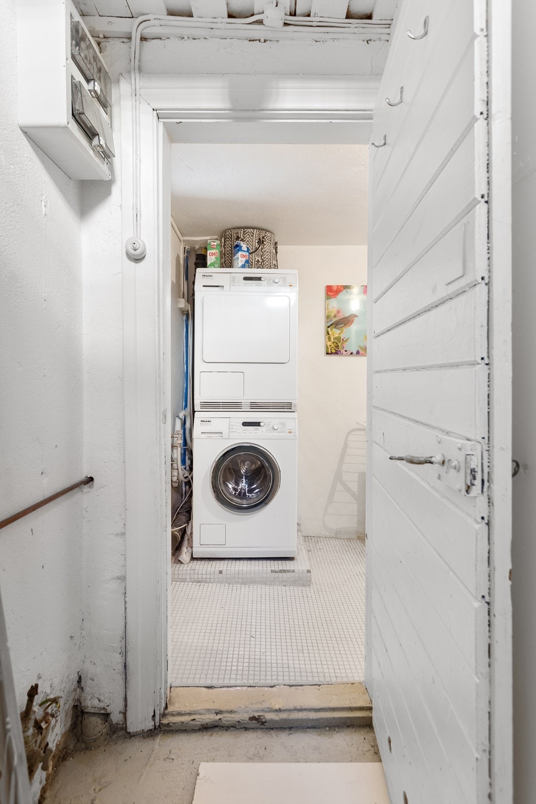 I kjelleren har man en praktisk bod/vaskerom. Galleribilde
