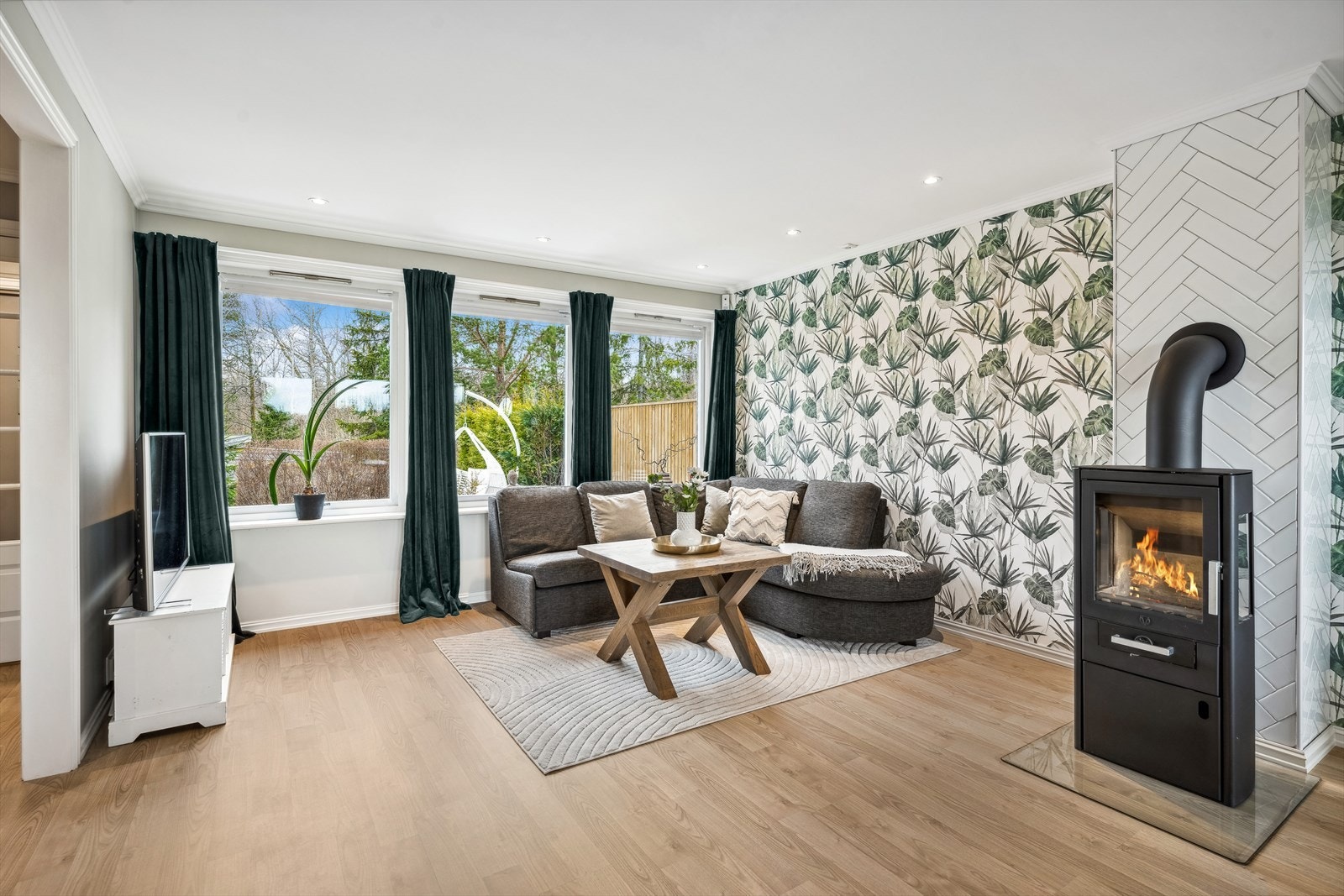 Lun og god sofakrok hvor familien kan samles på kveldene Galleribilde