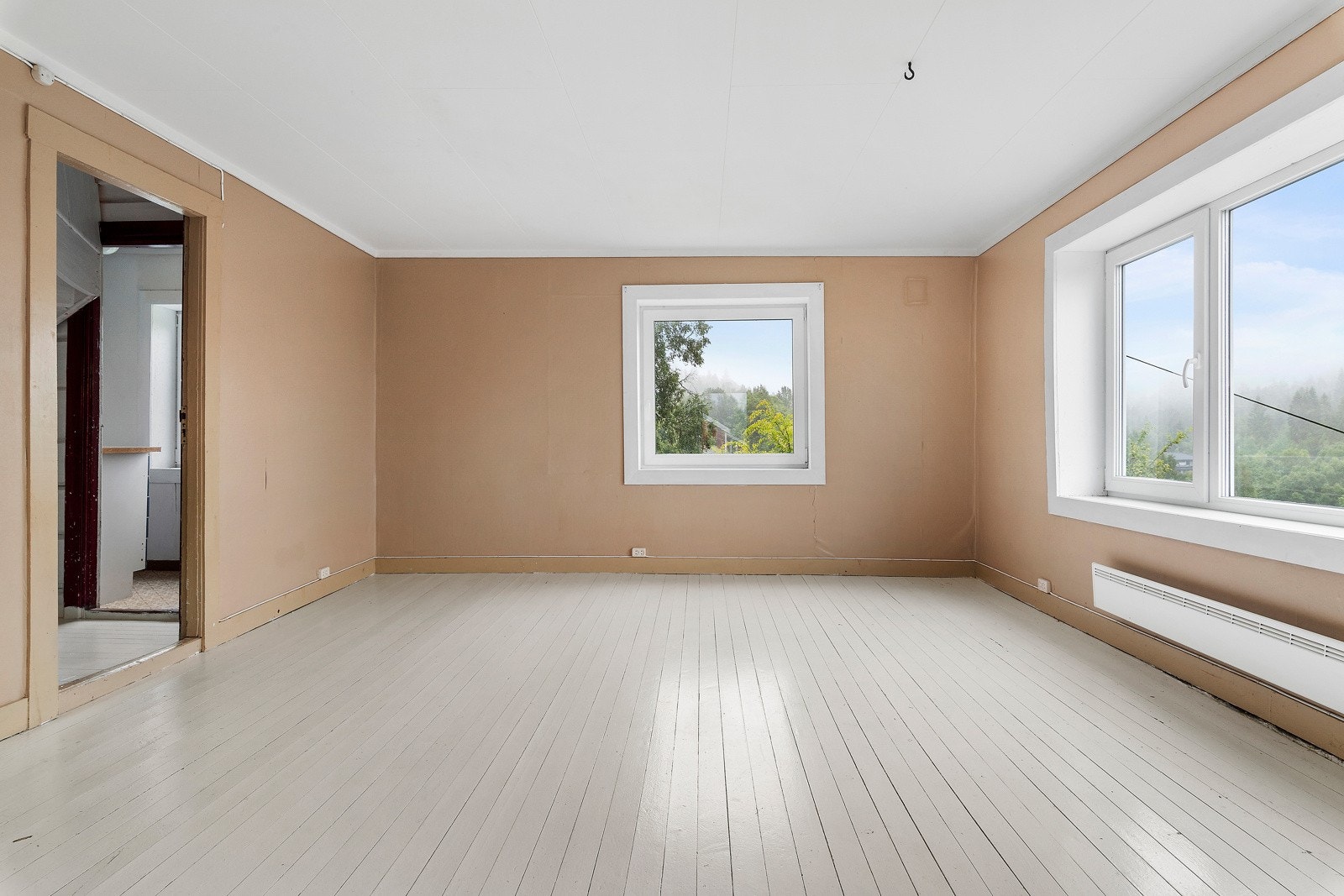 Dette er også en romslig stue som er lett å innrede. Galleribilde