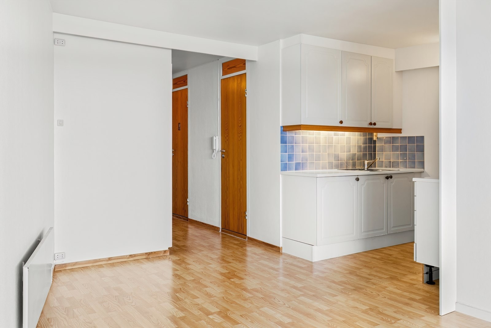 En herlig kvalitet med leiligheten er at man har mulighet til å lage mat samtidig som man er sammen med venner eller familie. Galleribilde