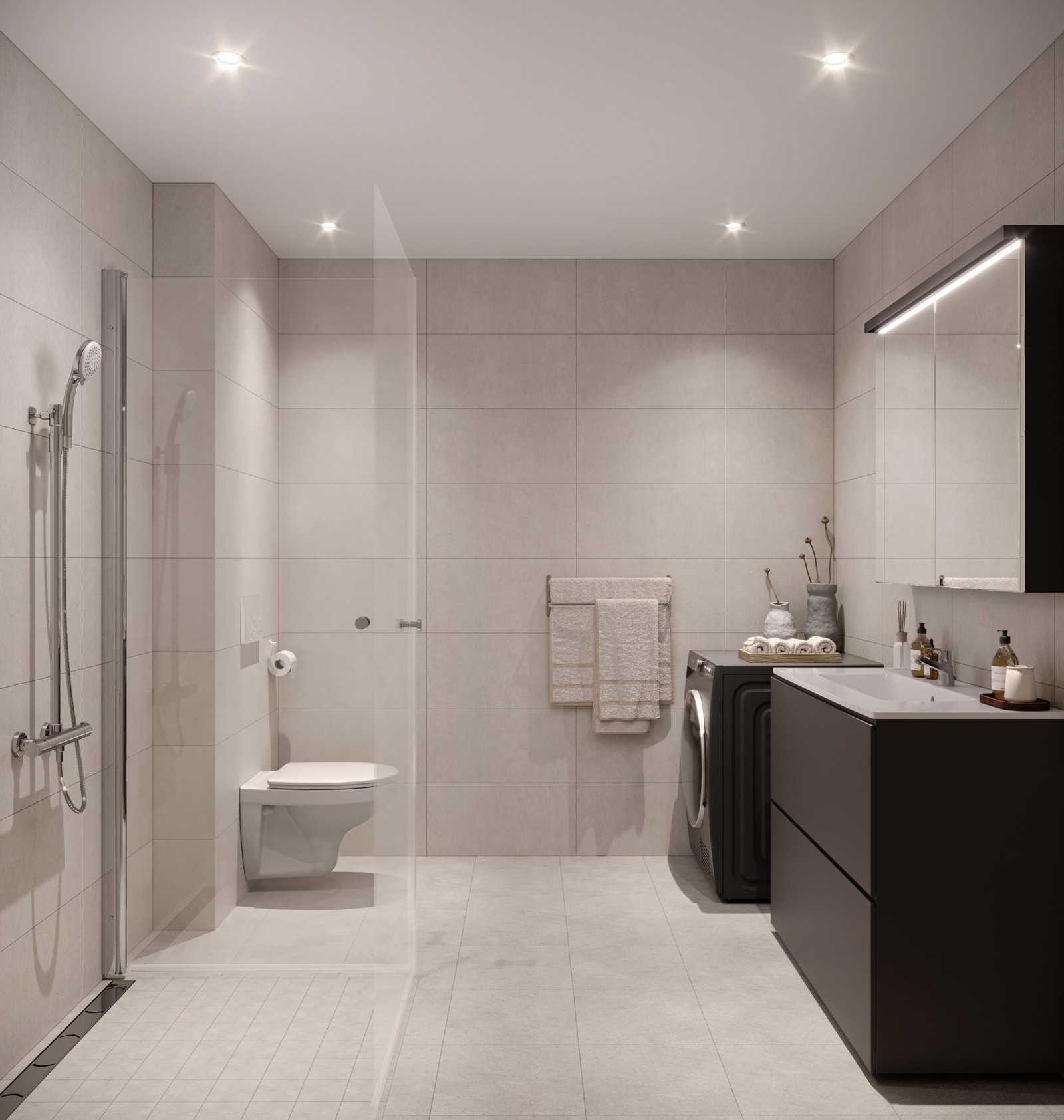 Flott flislagt og arealeffektivt bad med opplegg for vaske- og tørkemaskin Galleribilde