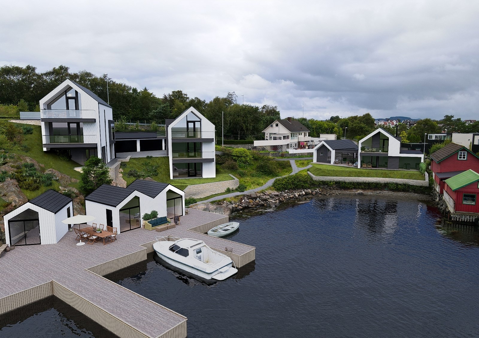 Det er medfølgende brygge og garasje til hver bolig. Mulighet for å kjøpe naust i tillegg. Galleribilde
