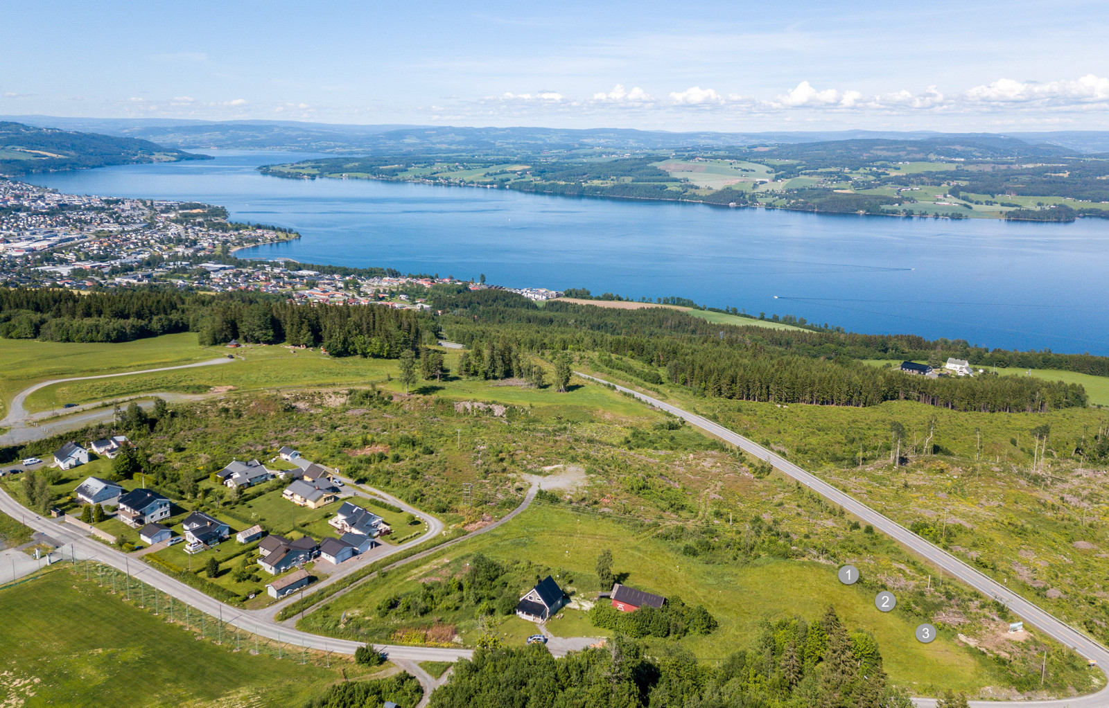 Dronefoto fra Østby_retning Gjøvik