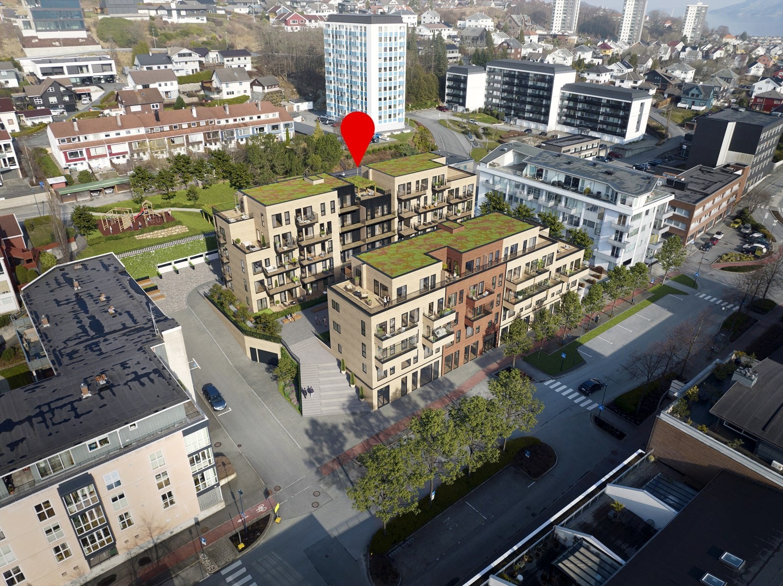 Leiligheten ligger i det bakre bygget, med heis opp til felles takterrasse. Galleribilde