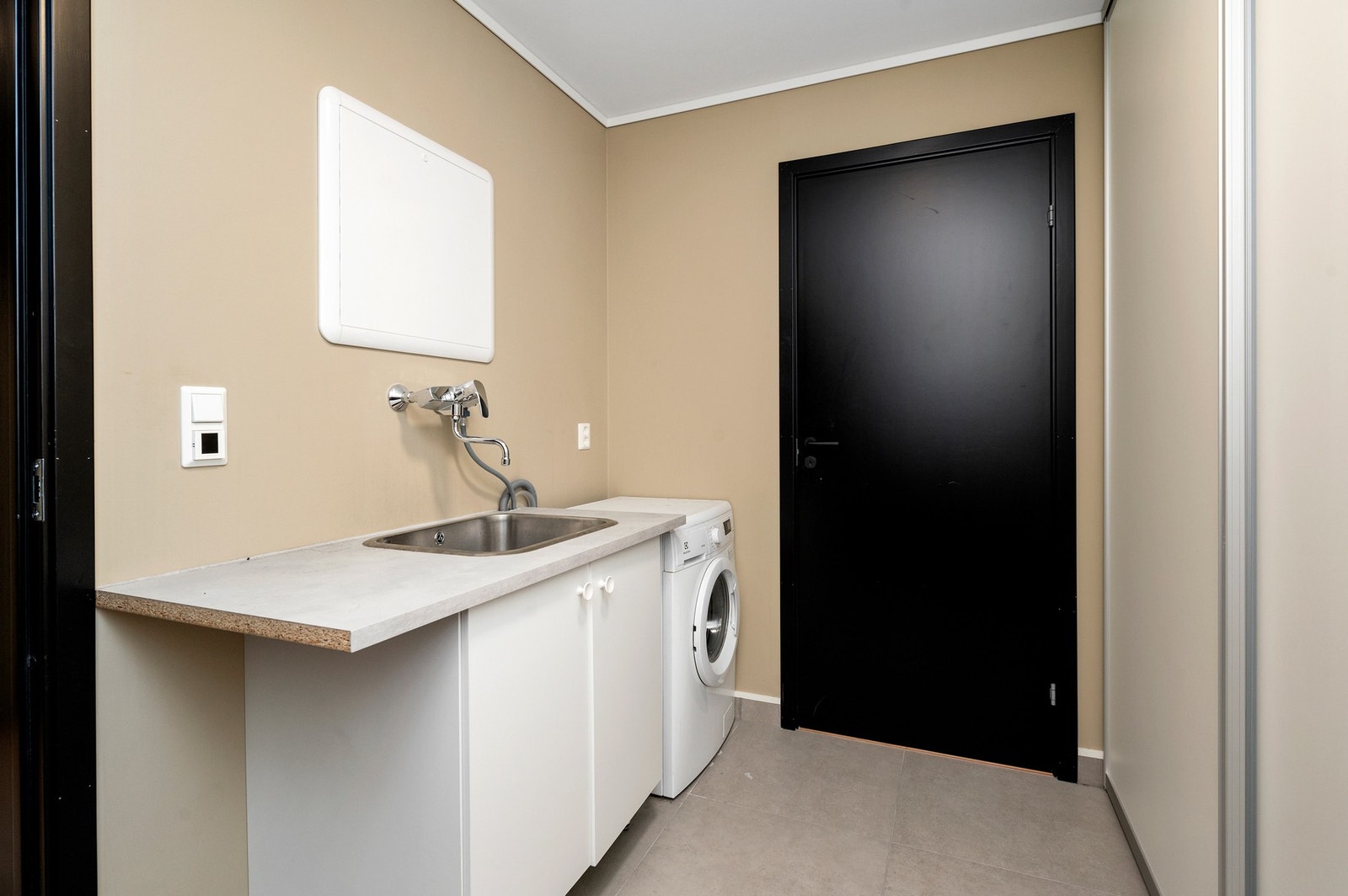 Flislagt vaskerom på 7 kvm. Galleribilde