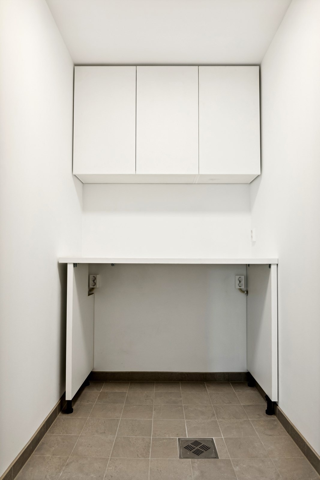 Praktisk vaskerom med gulvvarme Galleribilde