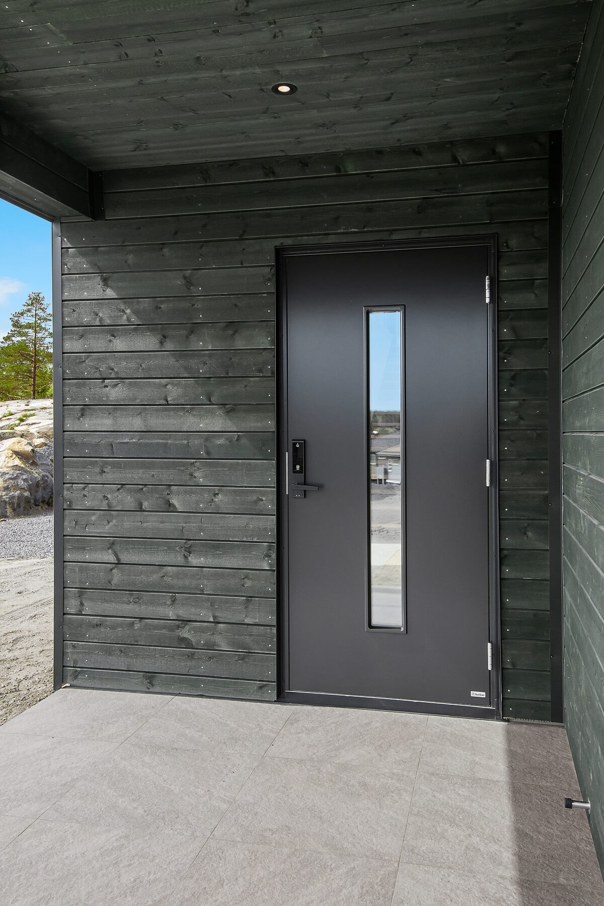 Overbygget inngangsparti er veldig praktisk Galleribilde