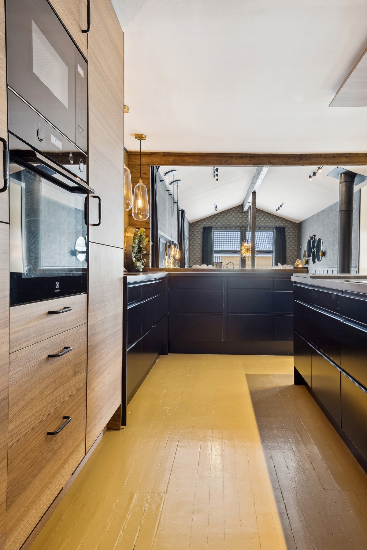 Kjøkkenet er utformet med en praktisk arbeidssone Galleribilde