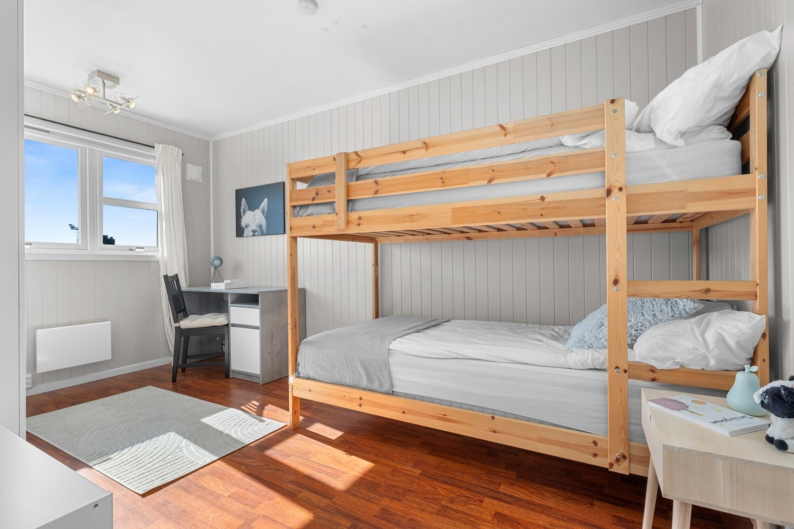 Rekkehuset oppvarmes elektrisk med stedvis panelovner. Galleribilde