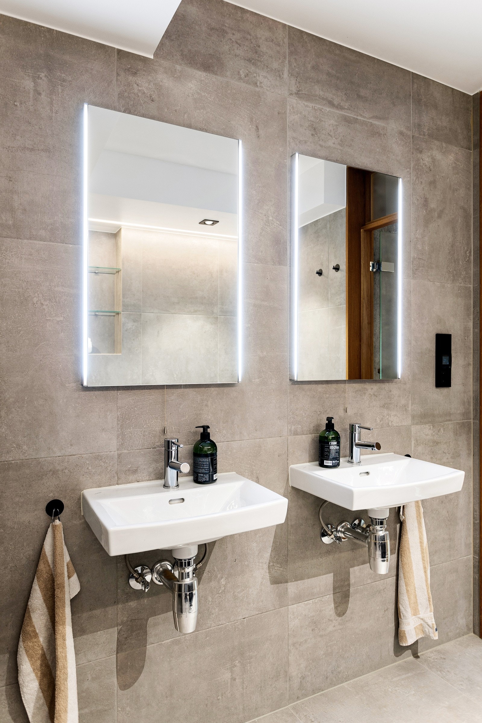 Badet har både elektrisk og vannbåren gulvvarme Galleribilde