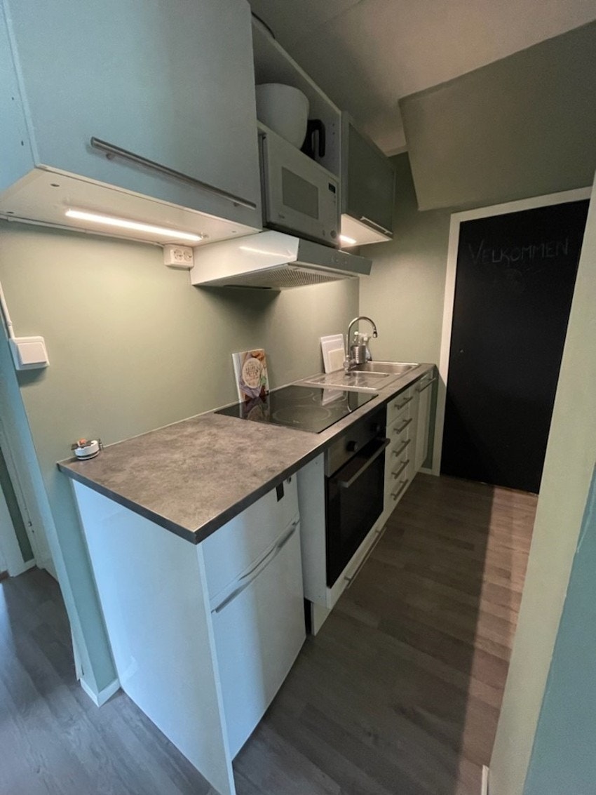 Kjøkken i boligens sokkeletasje - selgers egne bilder. Galleribilde