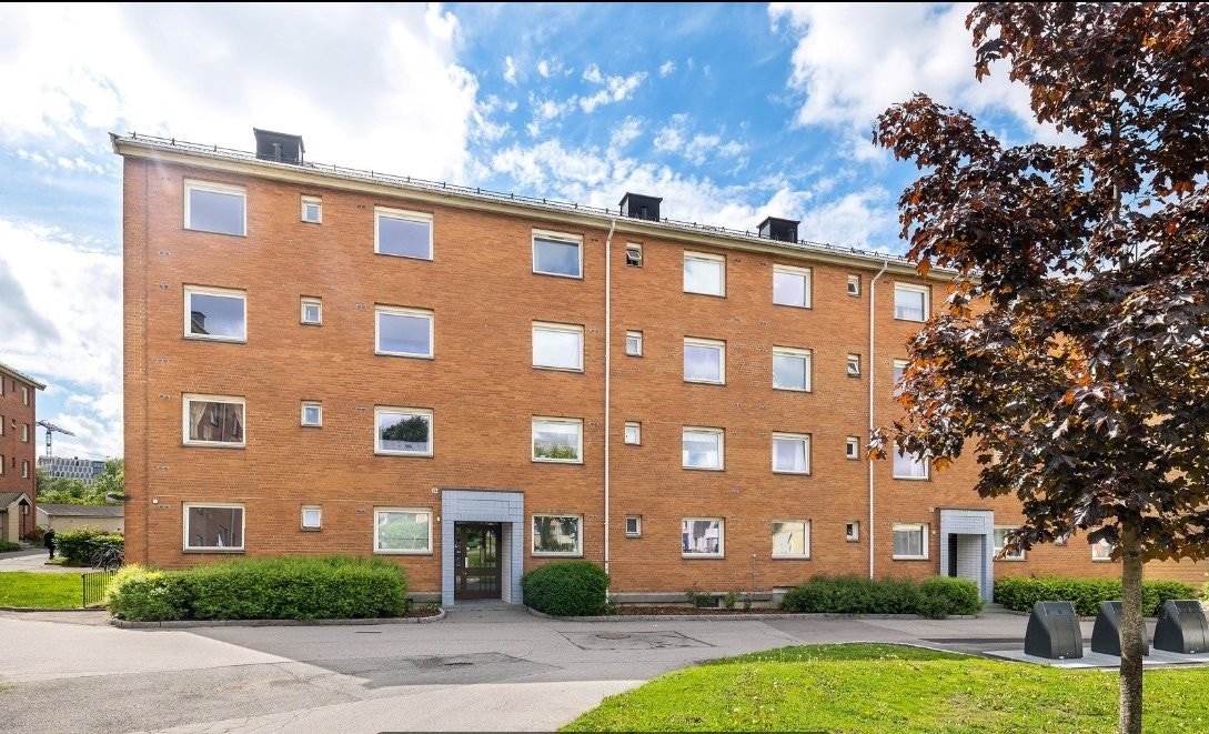 Forside av bygg. Leiligheten ligger i 4 etasje. Galleribilde