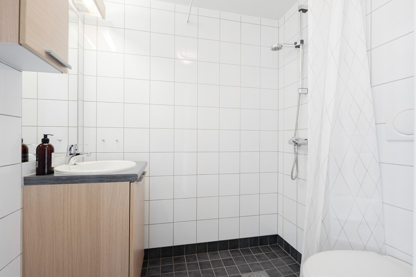 Flislagt bad med gulvvarme Galleribilde