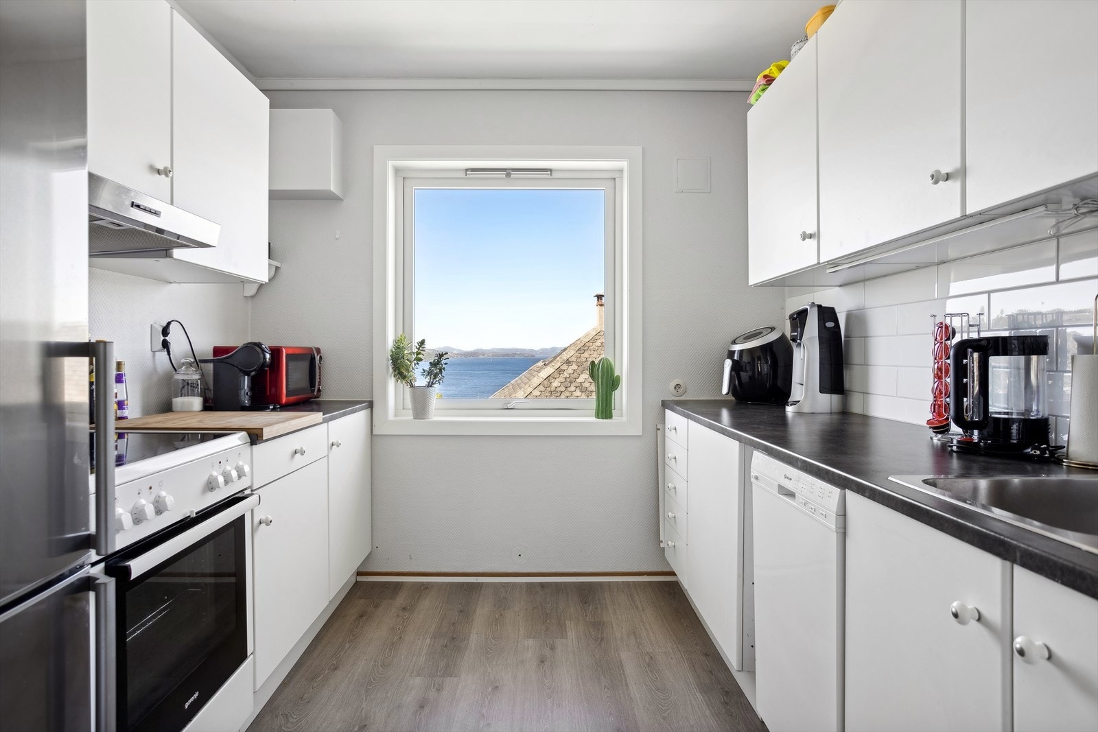 Kjøkken i en av leilighetene. Galleribilde