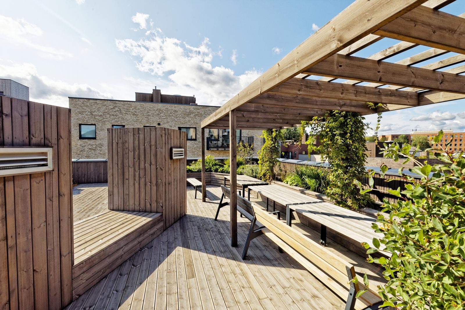 Beboere har tilgang til flere store og små takterrasser som er hyggelige å bruke for grilling, bursdagsfester og lignende Galleribilde